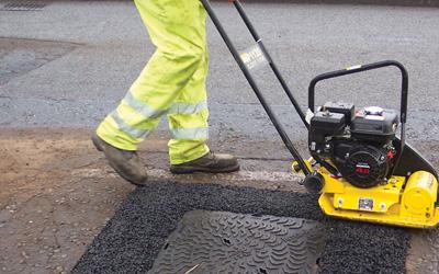 Smoothing a road surface
